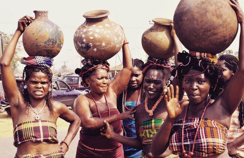 Ikwerre People of Biafra carrying pots on their head